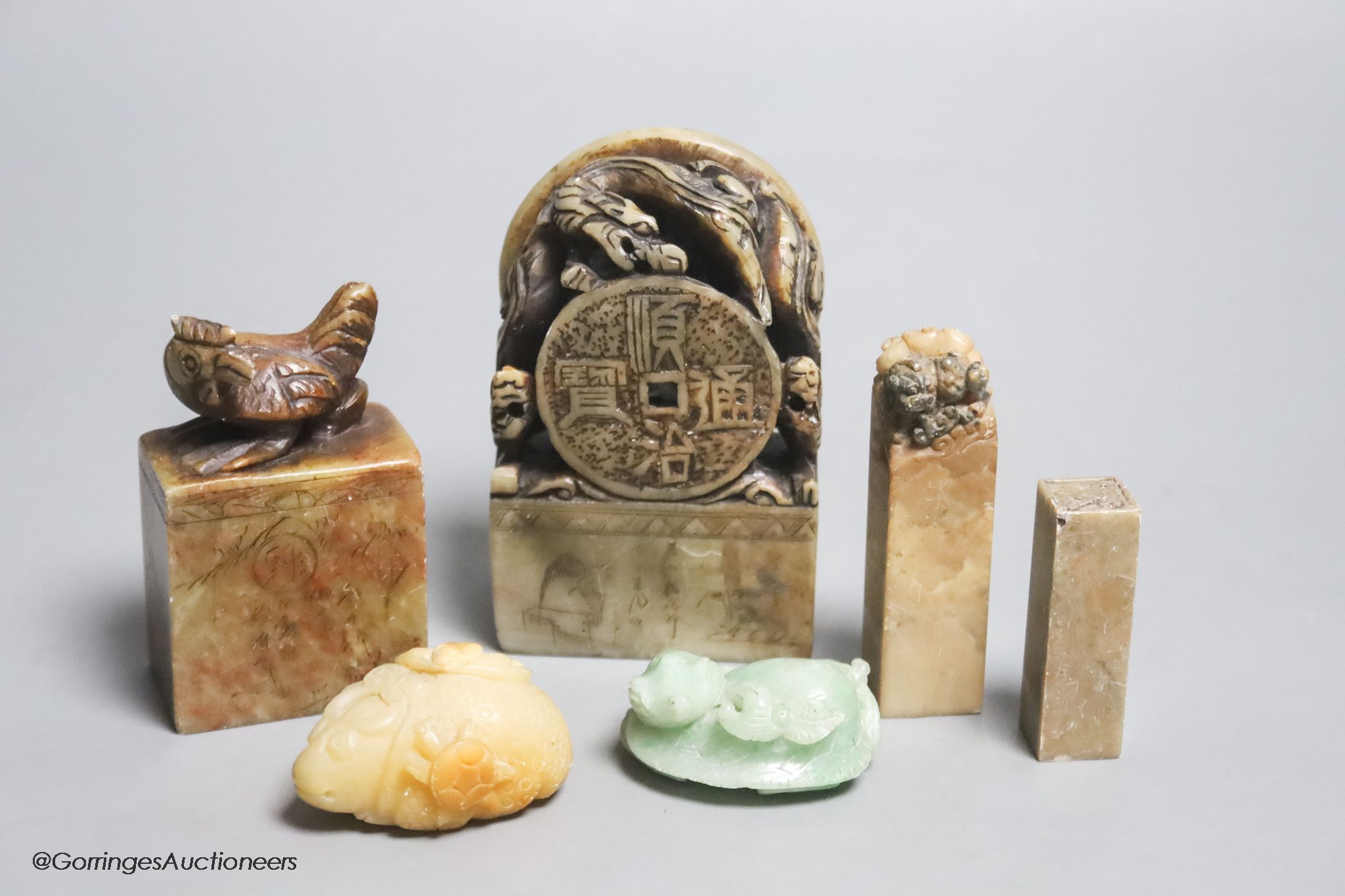 Six various Chinese jadeite and soapstone carvings, tallest 12cm